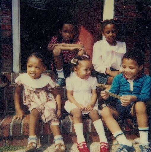 Image of Alisha and her siblings when they were young