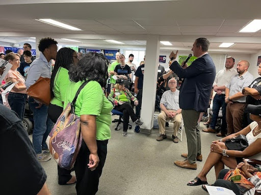 Johnny speaking to Volunteers