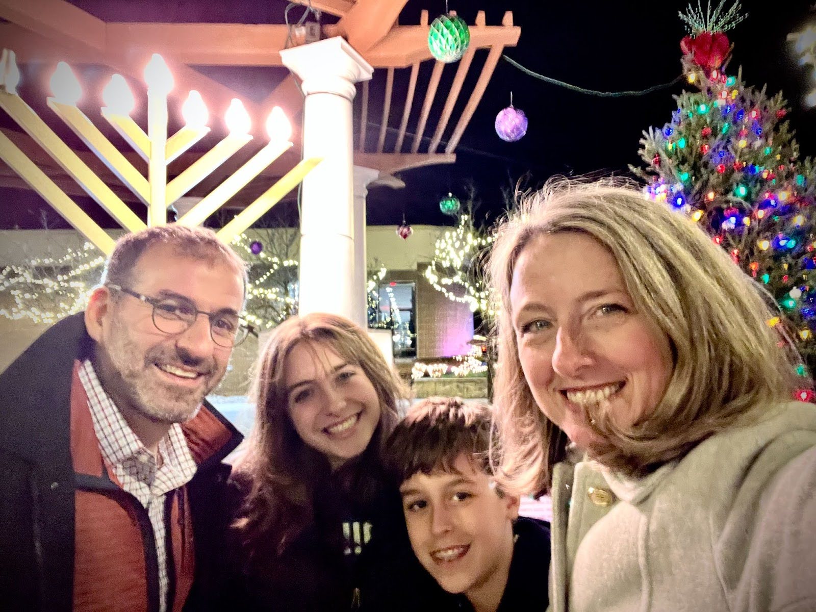 Beth Davidson and her family celebrating Hanukkah