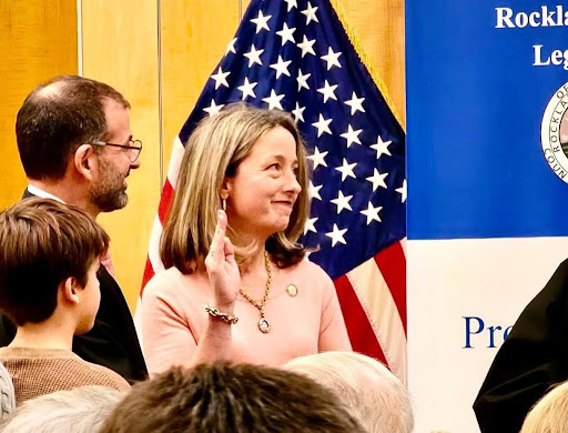 Beth Davidson swearing into the county legislature. 