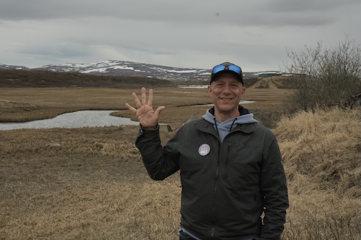 Bill holding up 5 fingers