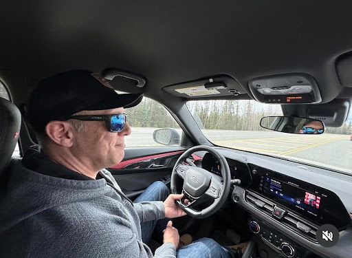 Bill driving through Alaska