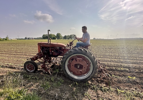 Blake on a tractor