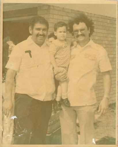 Picture of Bobby as a kid with family members