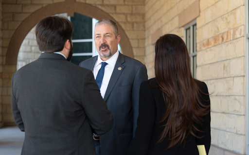 Bregman speaking with voters.