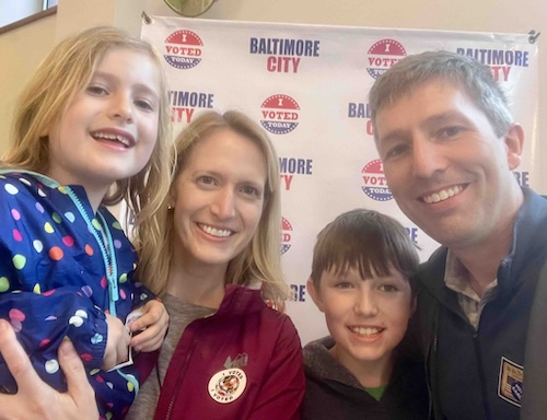 Photo of Brooke and her family voting early