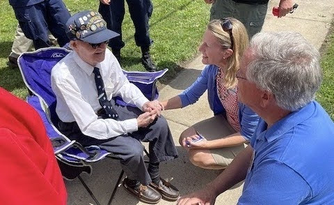 Picture of Brooke thanking a veteran for his service