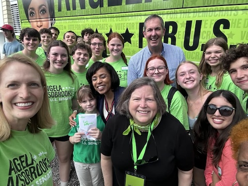 Photo of Brooke, Angela Alsobrooks, and volunteers