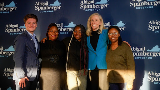 Abigail pictured next to her supporters