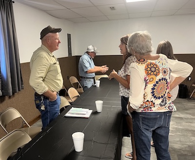 Picture of Don talking with folks at the event!