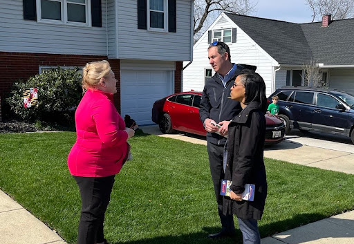 Johnny O engaging with a voter.