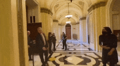 Gif of Kevin McCarthy avoiding a reporter.