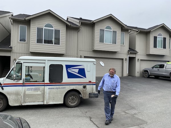 Glenn delivering mail