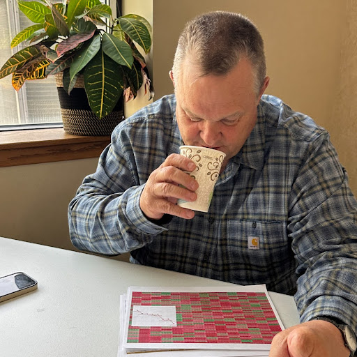 Tester drinking coffee