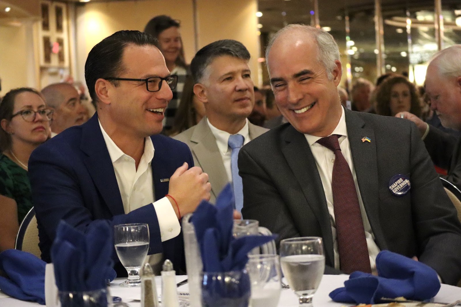 Photo of Josh Shapiro and Bob Casey sitting together.