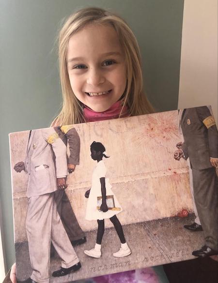 My six year old with Norman Rockwell’s painting depicting six year old Ruby Bridges