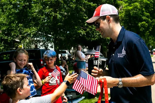 Zach Wahls at a 4th of July Parade