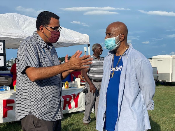 John speaking to a local faith activist in Kent County.