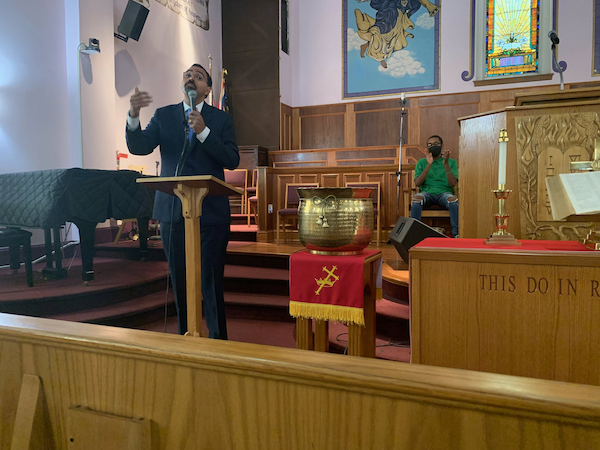 John speaking at a church in Baltimore.