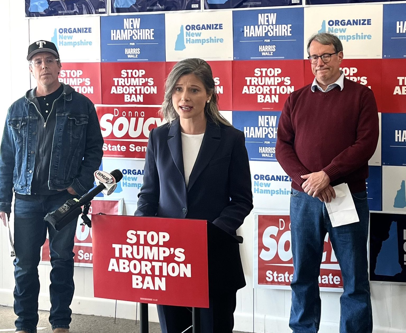 Maggie Goodlander speaking at a podium.