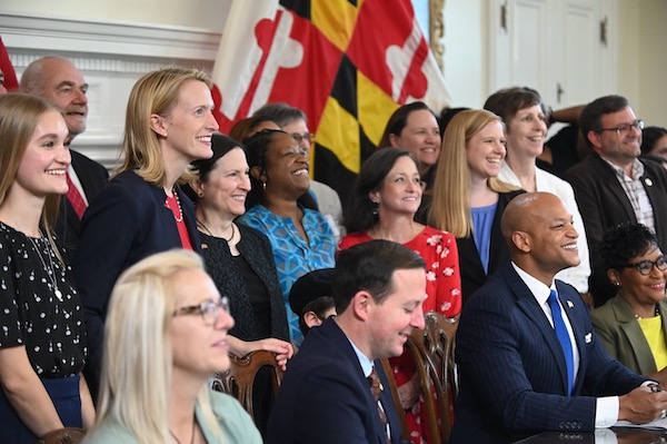 Photo of the Governor and Brooke with a group of people