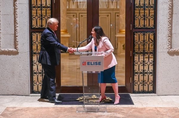 Image of Stefanik shaking hands with Trump