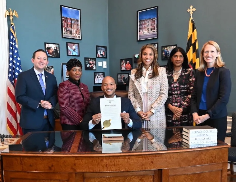 Photo of Governor Wes Moore alongside Brooke and state leaders 