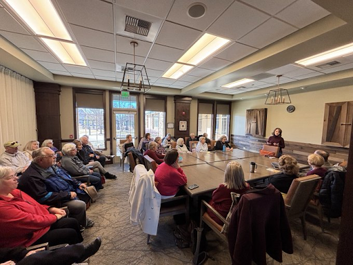 Shannon speaking to constituents