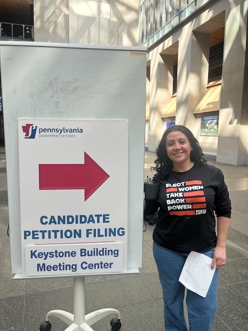 Photo of Carol submitting her petitions to qualify for the ballot in PA-07