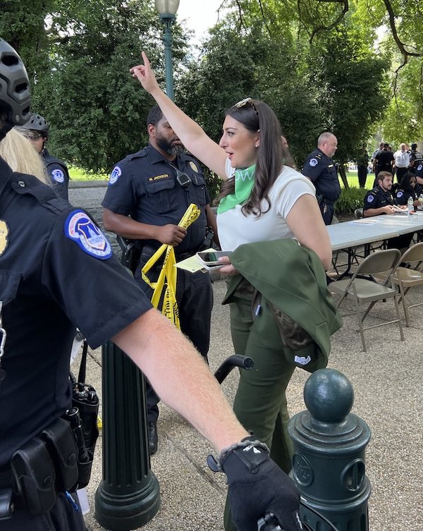 Sara being arrested while protesting for reproductive rights