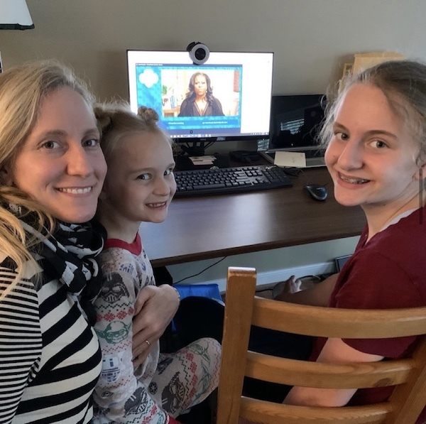 Spanberger and daughters participating in the Girl Scouts "I Am Becoming" event.