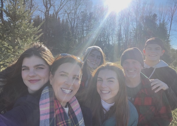 Shaheen family with their Christmas Tree