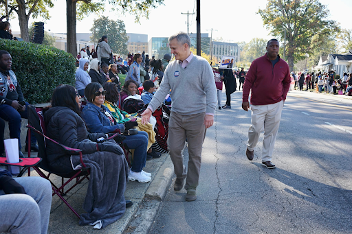 Josh Stein greeting voters 