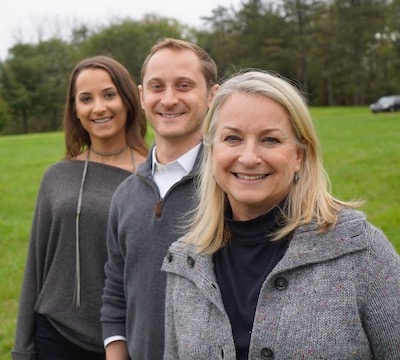 Photo of Adrienne, Clay, and Susan