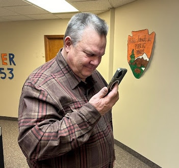 Jon Tester taking a phone call