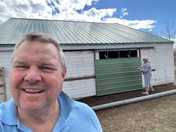 Photo of Jon Tester on his farm