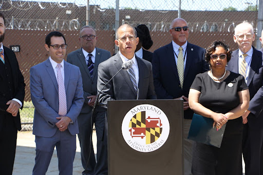 Anthony Brown speaking at a podium