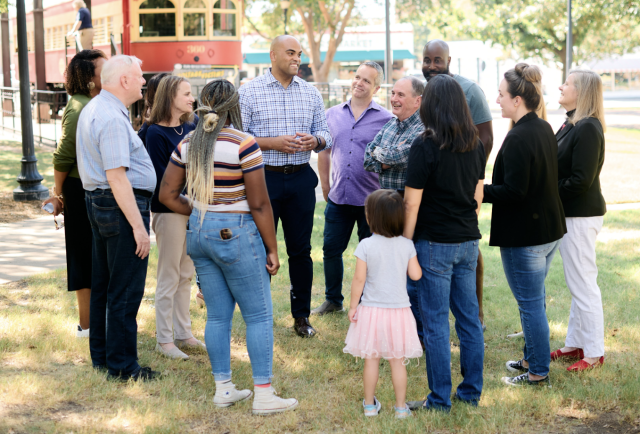 Colin Allred talking to a group of supporters