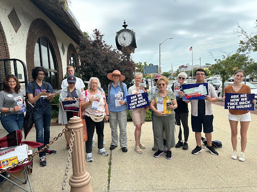 Laura volunteer's posing while campaigning