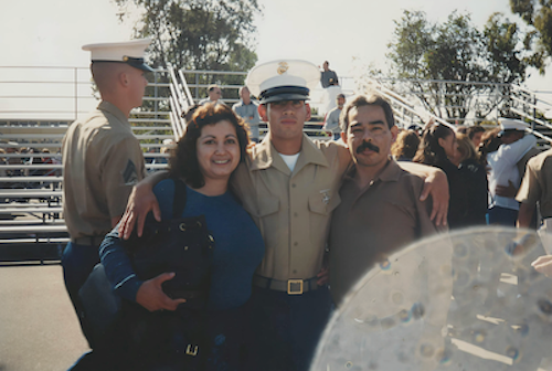 John in uniform with his parents