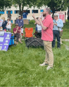GIF of Jeremy at an anti-ICE rally