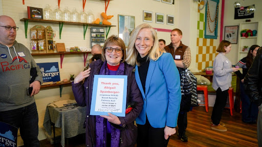 Abigail next to supporter thanking her for cosponsoring HR 82 Social Security Fairness Act