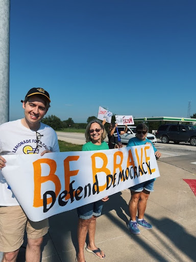Taylor Wettach connecting with voters in Muscatine.