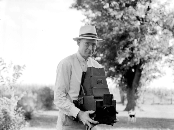 My grandfather, Arthur Melville “Pete” Wettach, taking a photo with his Graflex camera.